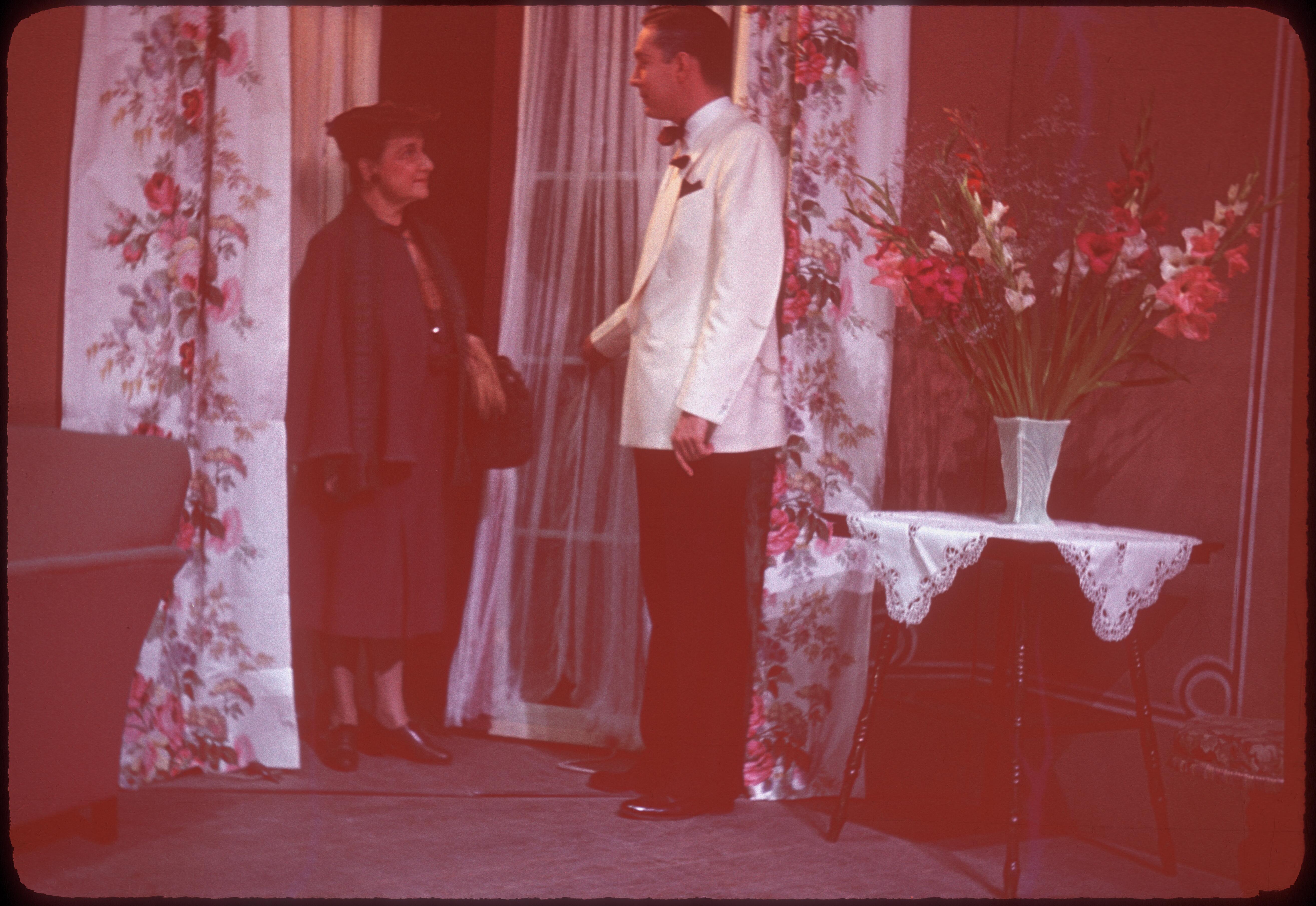 Lila Eccles Brimhall (Madame Arcati) and Carl Grayson (Charles Condomine), scene from Noel Coward's "Blithe Spirit" performed at Kingsbury Hall, University of Utah, July 19-20, 1946